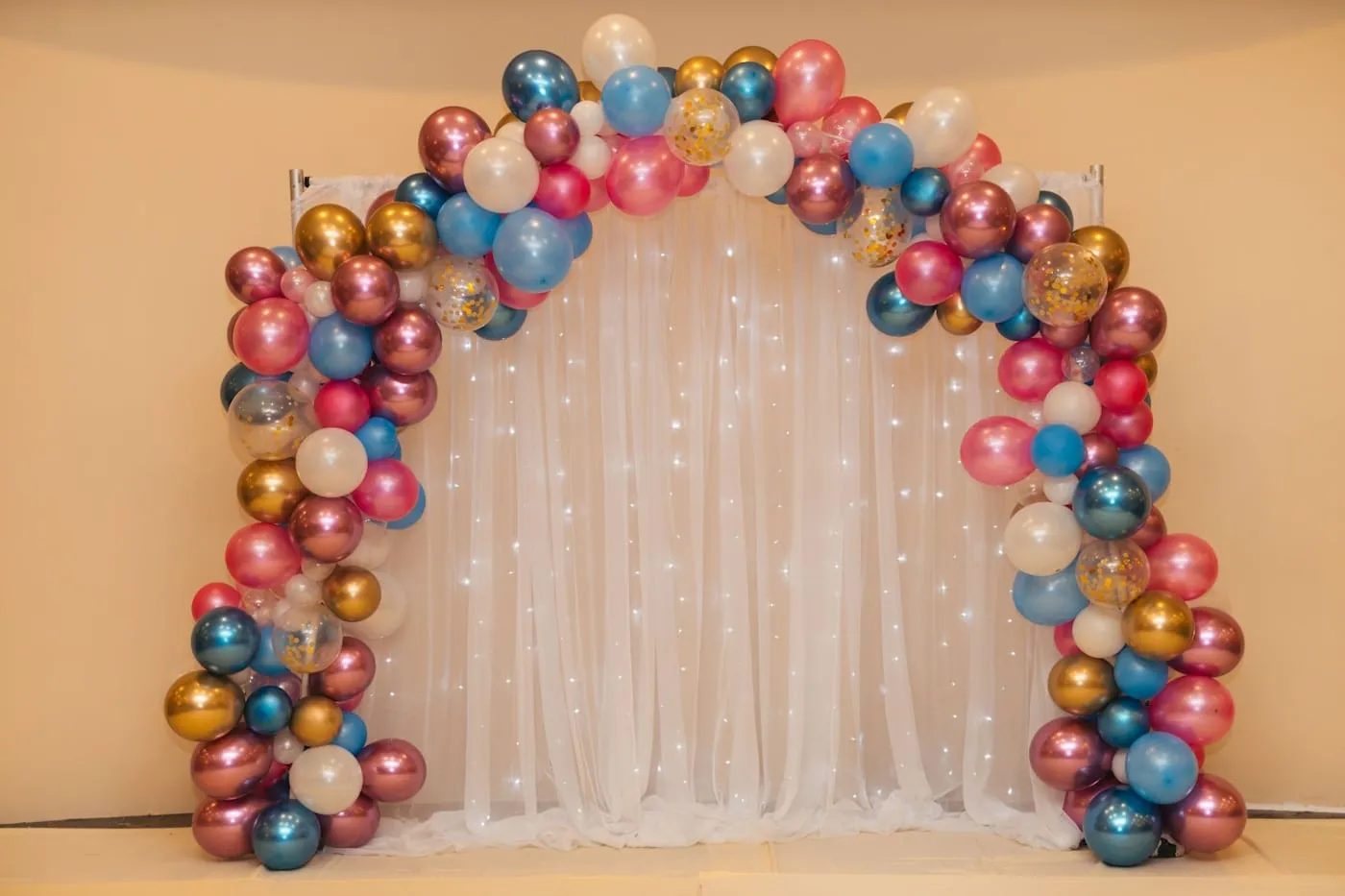 Colourful balloon arch set up for a celebration