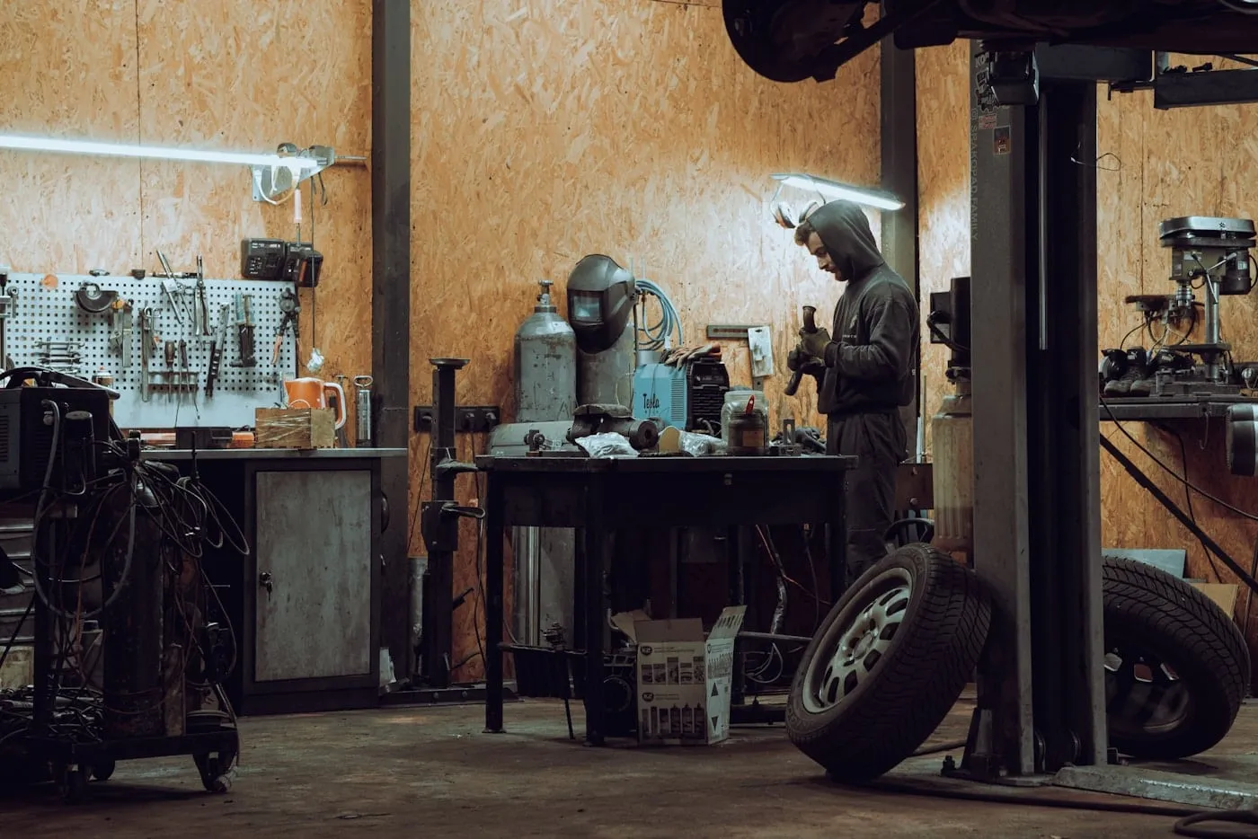 Mechanic checking a bike before it goes back out